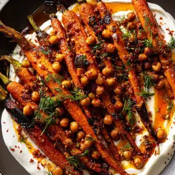 Spicy maple roast carrots with crispy chickpeas and yogurt sauce