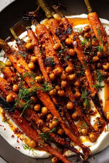 Spicy maple roast carrots with crispy chickpeas and yogurt sauce